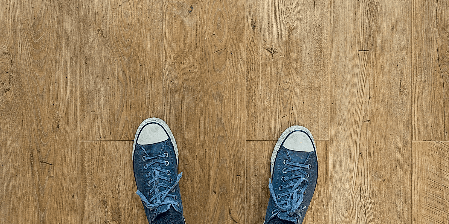Barbers Flooring | an image showing a person standing on a hard floor